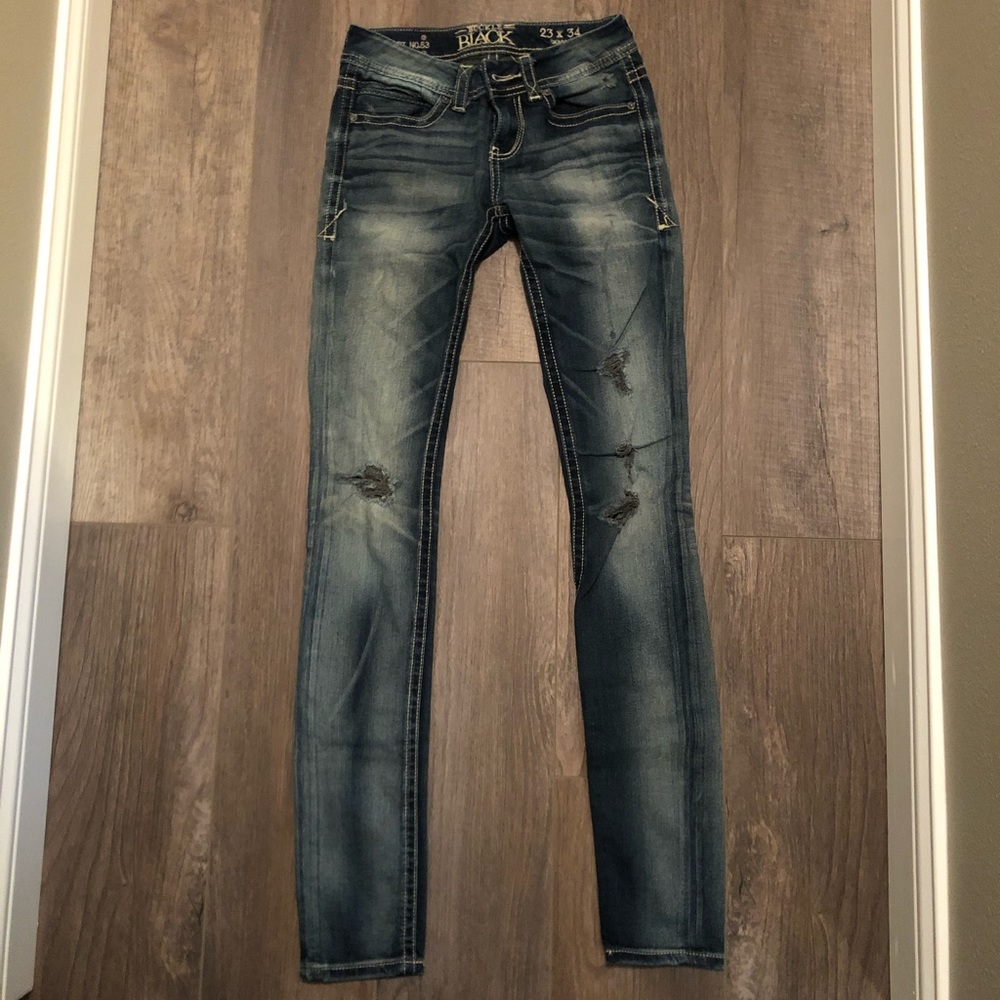 Buckle skinny jeans